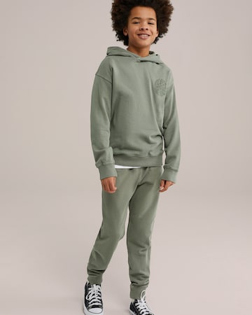 Tapered Pantaloni de la WE Fashion pe verde