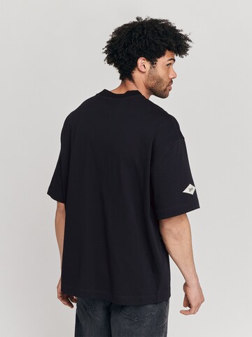 LYCATI exclusive for ABOUT YOU Shirt 'Playoffs' in Black