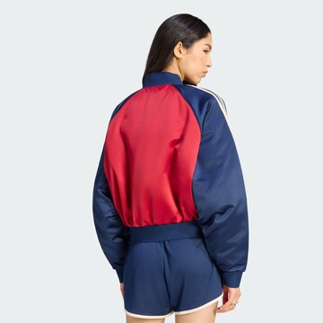 ADIDAS ORIGINALS - Chaqueta de entretiempo 'SST' en rojo