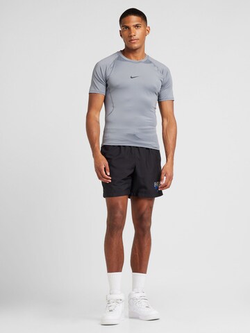 NIKE - Camiseta funcional 'PRO' en gris