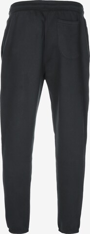 UNDER ARMOUR Tapered Workout Pants 'Project Rock Originators' in Black