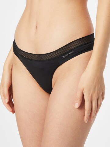 Calvin Klein Underwear Thong in Black: front