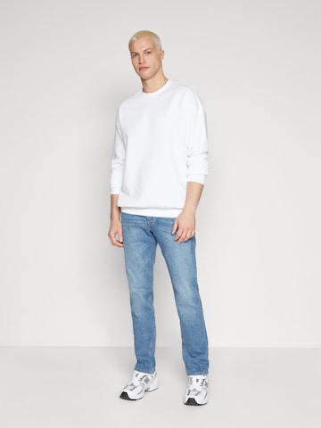 DIESEL Slim fit Jeans '1986 LARKEE-BEEX' in Blue