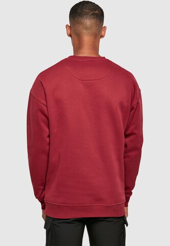 Merchcode Sweatshirt 'Be Happy' in Rot