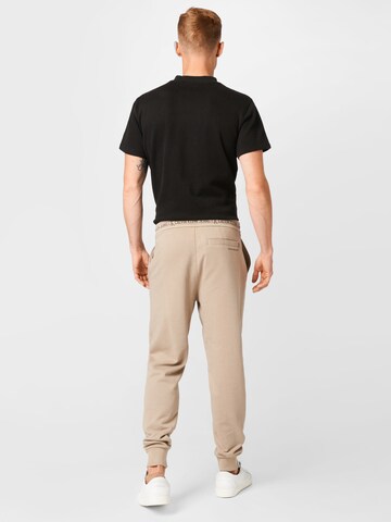 Calvin Klein Jeans Tapered Hose in Beige