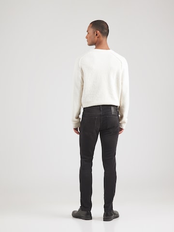 Slimfit Jeans '734' di HUGO in nero