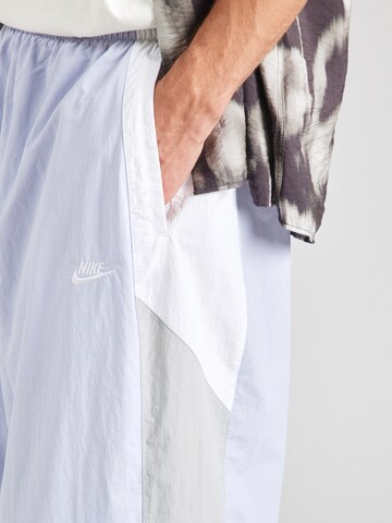 Tapered Pantaloni 'CLUB' de la Nike Sportswear pe alb