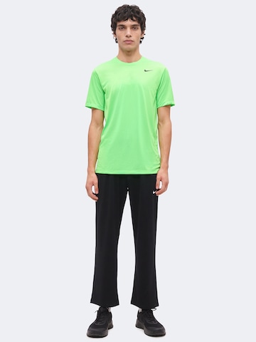 NIKE regular Παντελόνι φόρμας 'FLEX' σε μαύρο