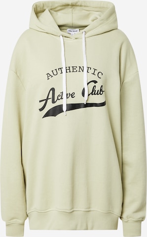 Public Desire Sweatshirt in Green: front