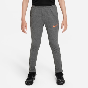 NIKE Skinny Workout Pants in Grey: front