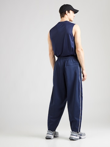 Nike Sportswear Loosefit Housut 'CLUB' värissä sininen