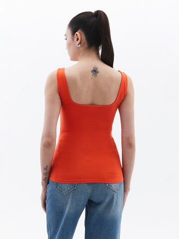 OXXO Top in Oranje