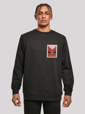 Sweat-shirt 'Santa Letter' F4NT4STIC en noir : devant