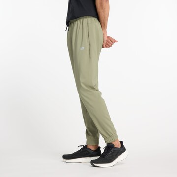 Effilé Pantalon de sport new balance en vert