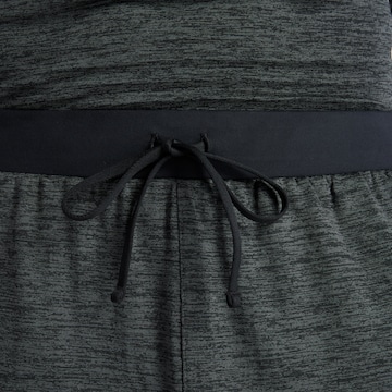 Effilé Pantalon de sport 'Athletics Heat Grid' new balance en noir