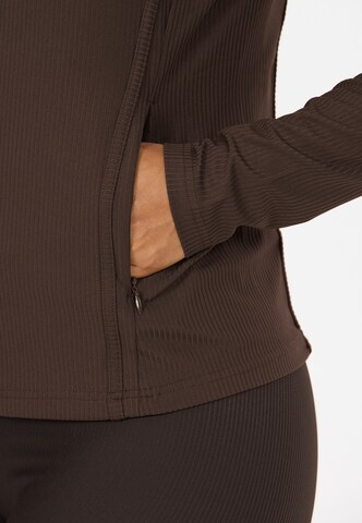 Athlecia Sportjacke 'Thrine' in Braun