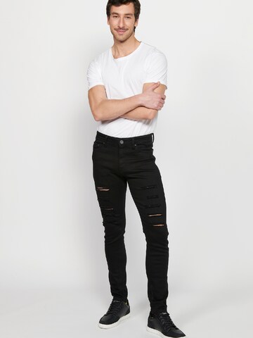 Slimfit Jeans di KOROSHI in nero