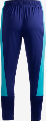 UNDER ARMOUR Slimfit Sportbroek in Blauw