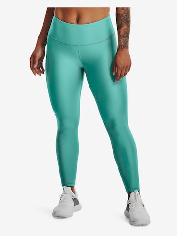 UNDER ARMOUR Skinny Workout Pants in Green: front