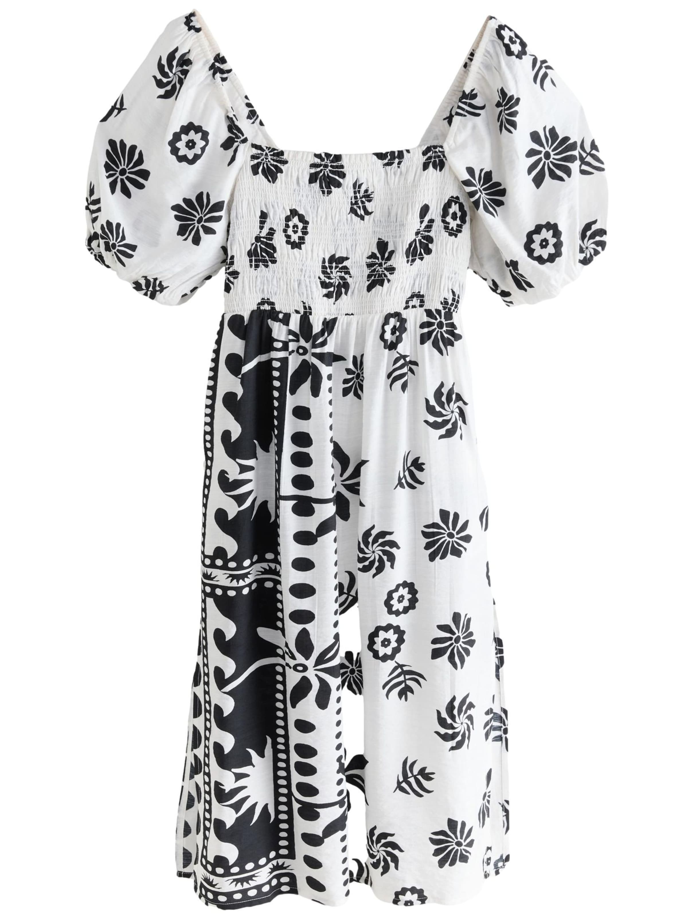 Rochie de la Next pe alb: față