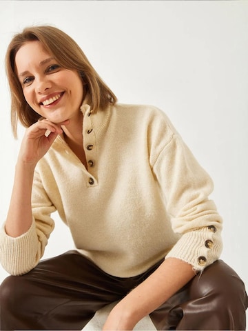 Bianco Lucci Trui in Beige