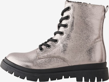 Bottes Next en argent : devant