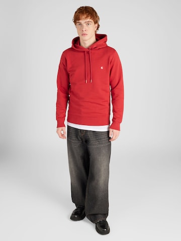 raudona Calvin Klein Jeans Megztinis be užsegimo