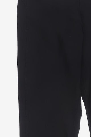 UNDER ARMOUR Pants in M in Black