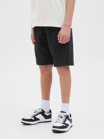 Loosefit Pantalon Jack & Jones Junior en noir : devant