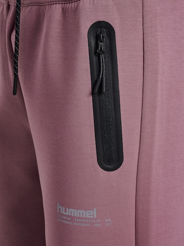 Hummel Regular Sports trousers in Pink
