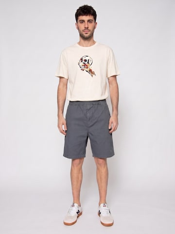 Carhartt WIP Baggy Trousers 'Flint Short Cozy Blue' in Grey: front