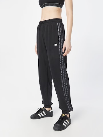 Tapered Pantaloni 'Abstract Animal Print' di ADIDAS ORIGINALS in nero: frontale