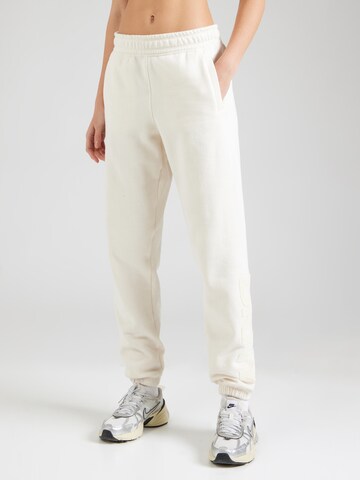 Tapered Pantaloni sportivi di DKNY Performance in bianco: frontale