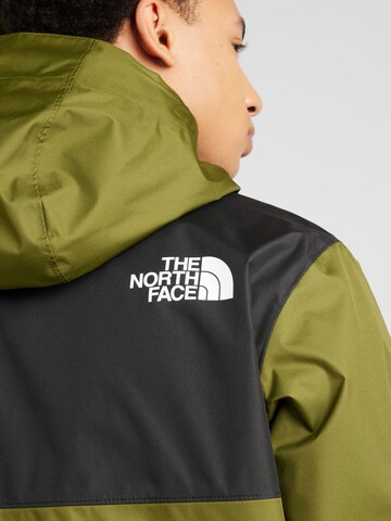 THE NORTH FACE Ulkoilutakki 'MOUNTAIN' värissä vihreä