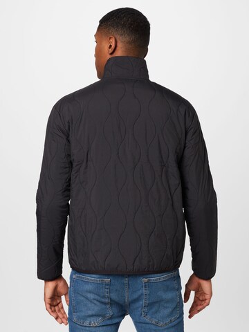 PUMA - Chaqueta de entretiempo 'T7 Quilting' en negro