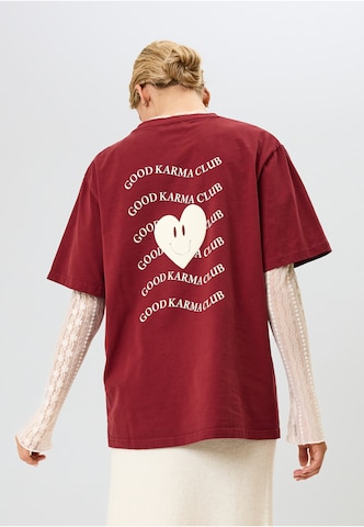 OH APRIL Shirt 'Good Karma Wave' in Orange: front