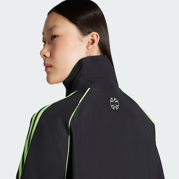 ADIDAS ORIGINALS Between-season jacket 'Teamgeist Adicolor' in Black