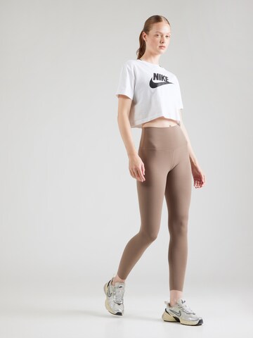 ruda NIKE Siauras Sportinės kelnės 'ZENVY'