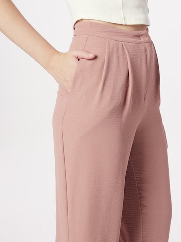 Tapered Pantaloni 'Ava' di ABOUT YOU in rosa