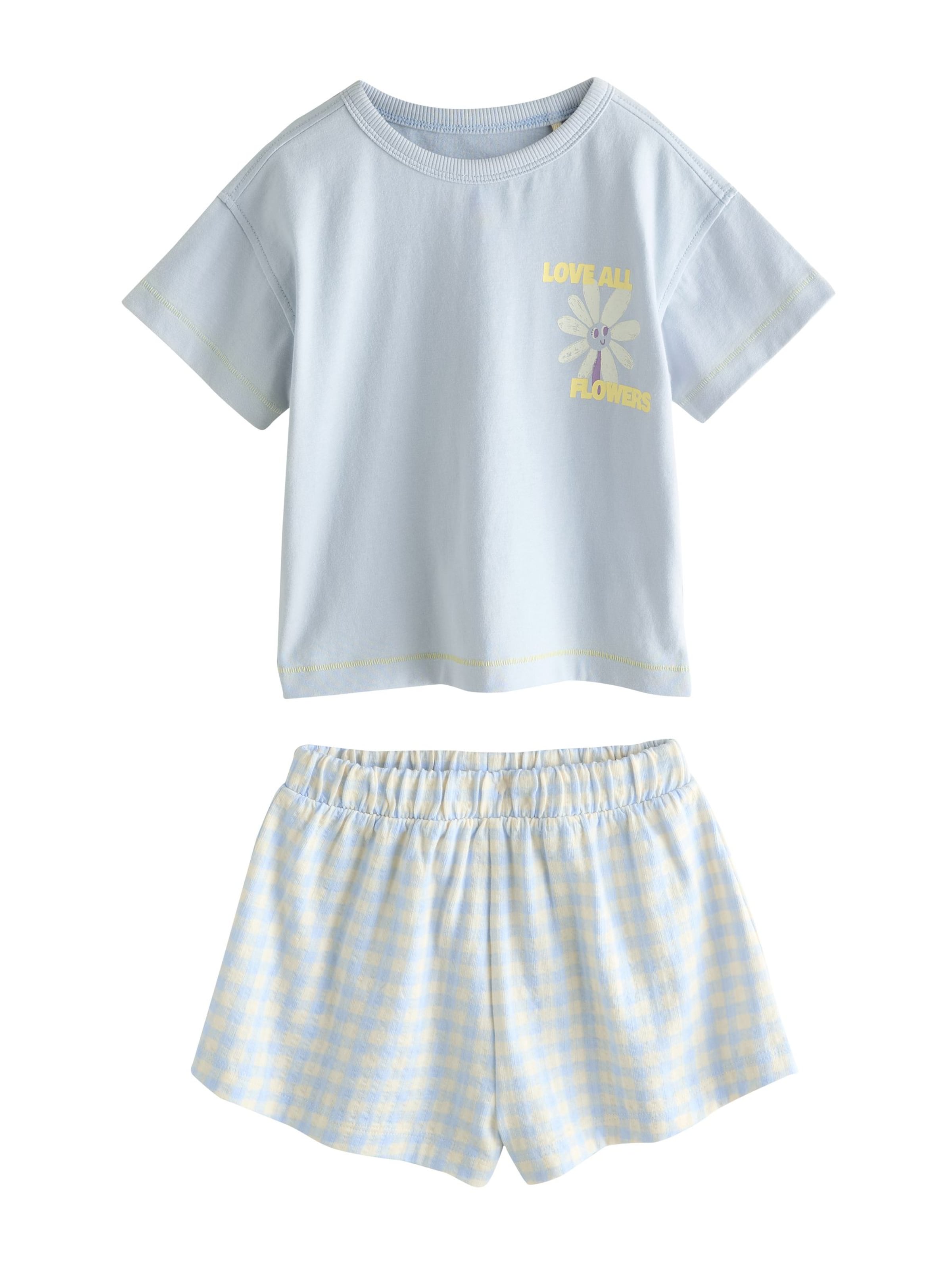 Pijamale de la Next pe bej