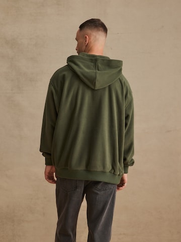 DAN FOX APPAREL Hoodie 'Rayan' (GRS) in Grün