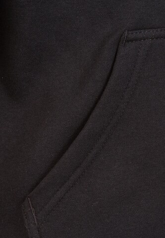 NIKE Sportsweatjacke 'Club 19' in Schwarz