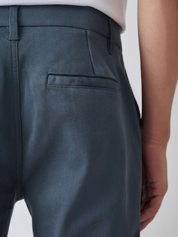 Next Slimfit Chinobyxa i blå