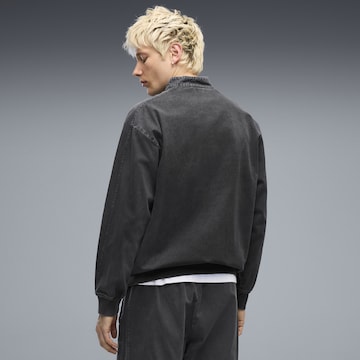 PUMA Trainingsjack 'FUTURE.PUMA.ARCHIVE T7' in Zwart