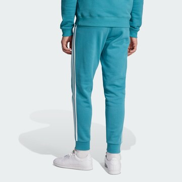 ADIDAS ORIGINALS Slimfit Hose 'Adicolor Classics' in Blau