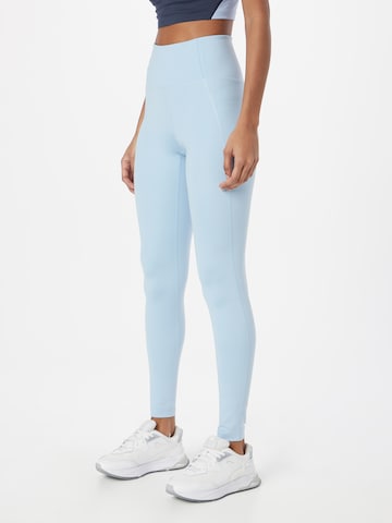 Girlfriend Collective Skinny Workout Pants in Blue: front