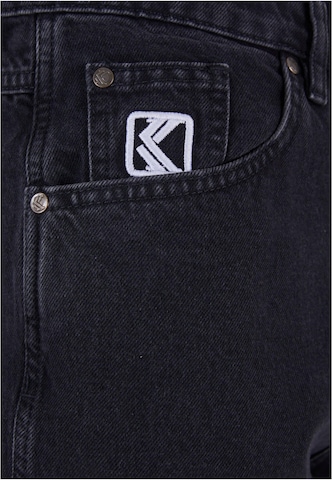 Karl Kani Tapered Jeans in Black