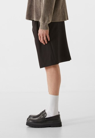 Lost Youth Loose fit Pleat-Front Pants in Black