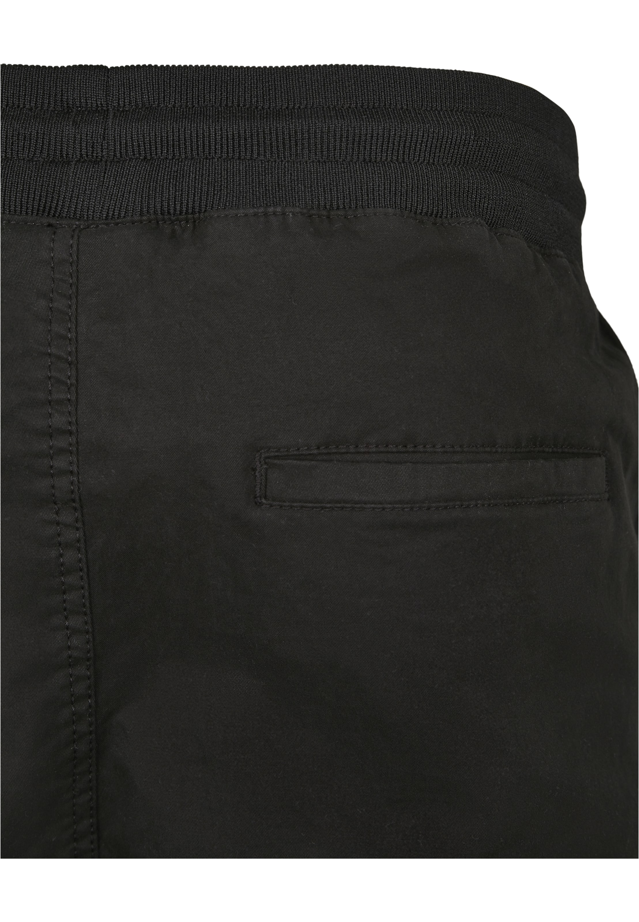 Tapered Pantaloni cu buzunare 'Tactical' de la Urban Classics pe negru