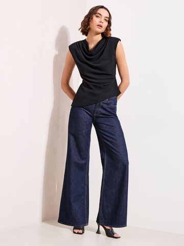 melns Friends Like These Blūze